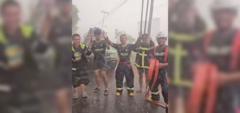 Firefighters celebrate rain during Indonesia wildfires